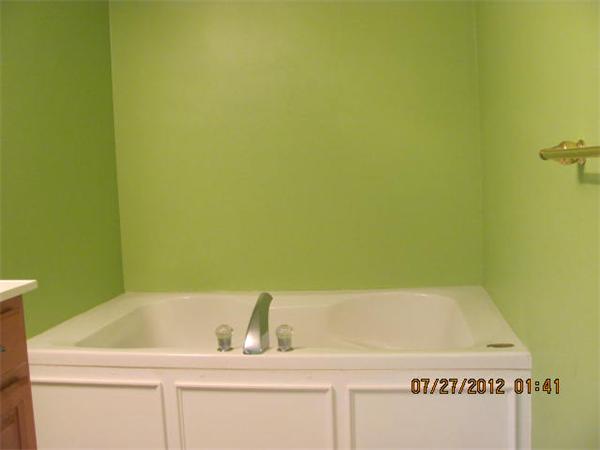 18 Winifreds Way Rutland, MA 01543 - Photo 12 of 13 a bathroom with a bathtub