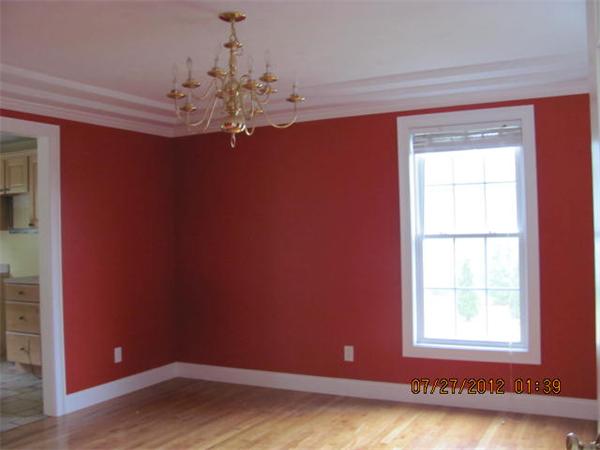 18 Winifreds Way Rutland, MA 01543 - Photo 4 of 13 a view of empty room with wooden floor and fan