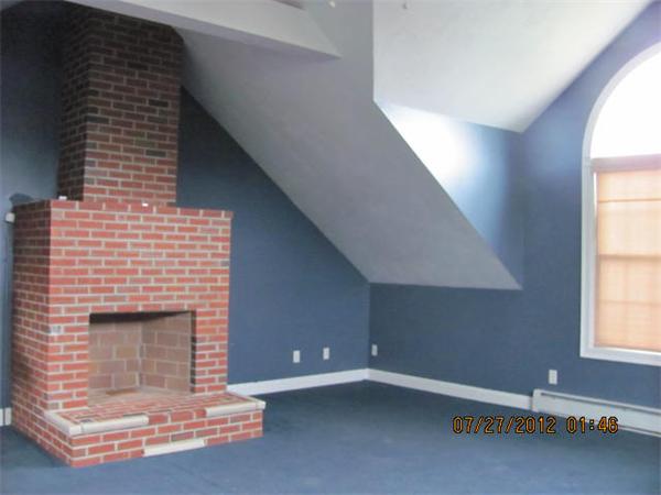 18 Winifreds Way Rutland, MA 01543 - Photo 5 of 13 a living room with a fireplace