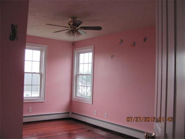 18 Winifreds Way Rutland, MA 01543 - Photo 10 of 13 a view of an empty room with a window