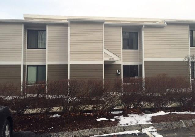 33 Lawson Lane, Unit 33 Ridgefield, CT 06877 - Photo 1 of 1 a view of a house with a yard