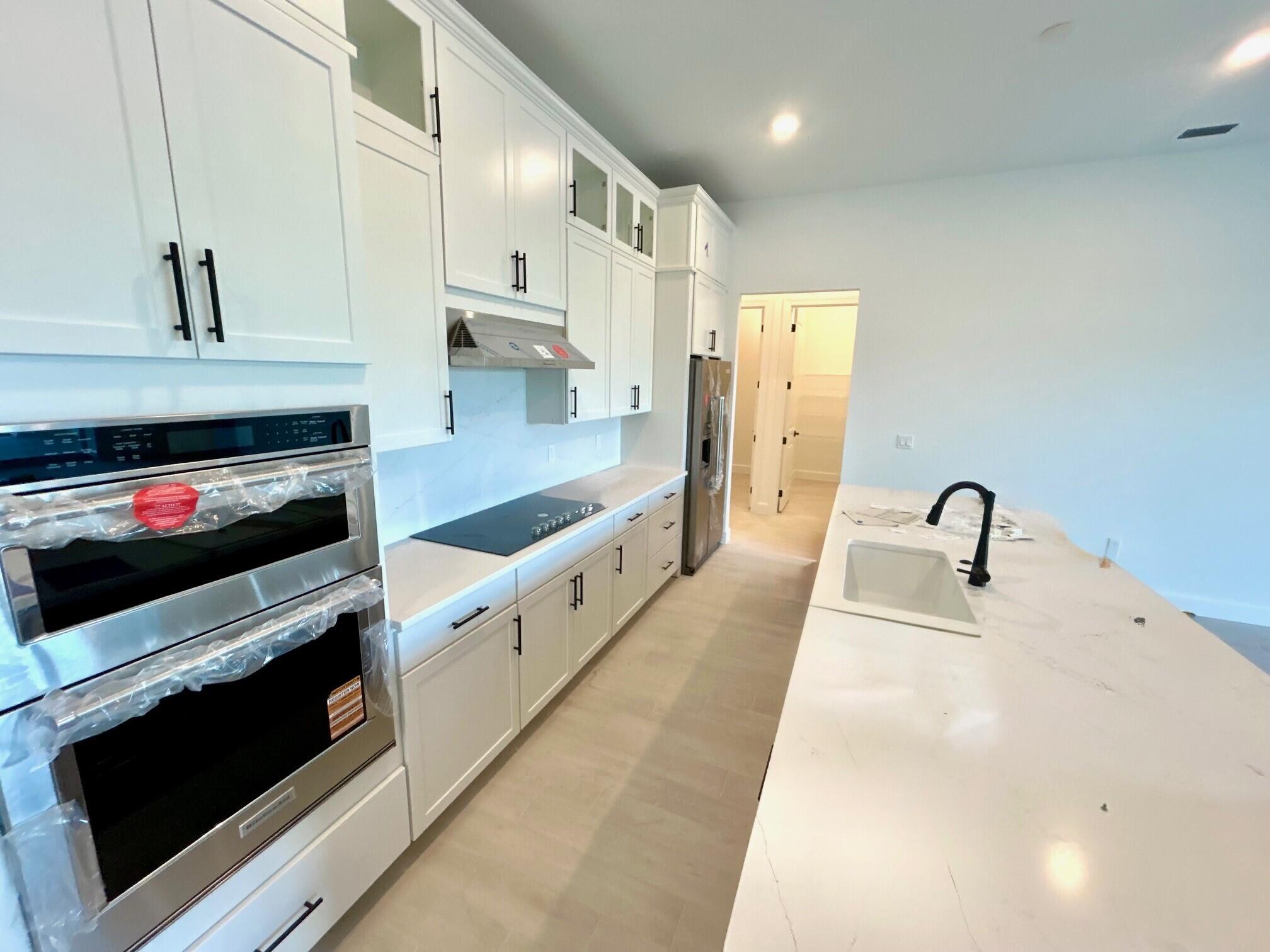 10200 Southwest Highpointe Drive, Unit ASHBY 97 Stuart, FL 34997 - Photo 10 of 34 97 Kitchen progress