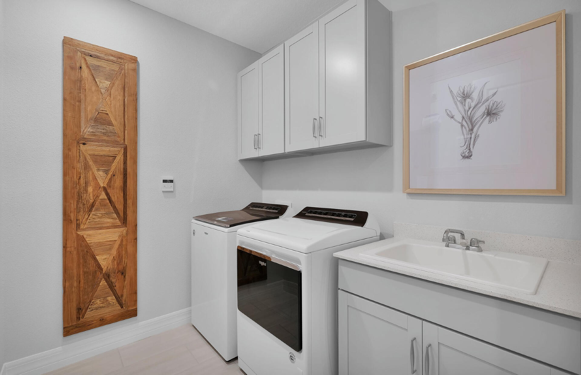 10200 Southwest Highpointe Drive, Unit ASHBY 97 Stuart, FL 34997 - Photo 22 of 34 Laundry