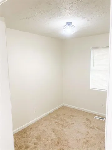 an empty room with a workbench