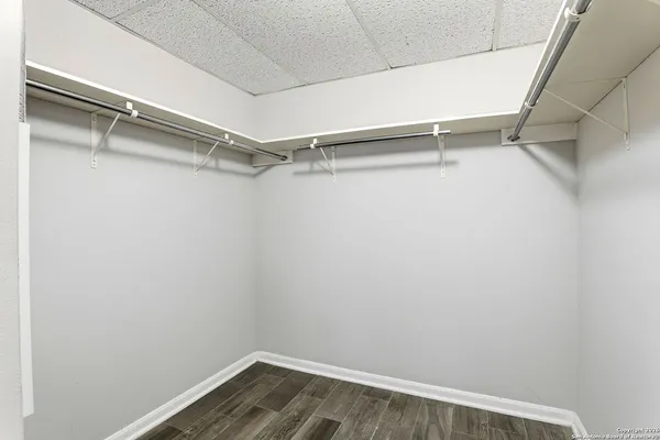 a view of an empty walk in closet