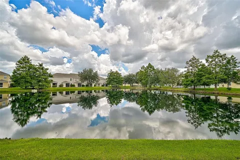 a view of a lake with a big yard