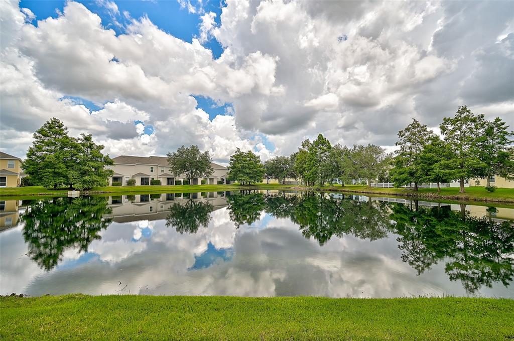 a view of a lake with a big yard