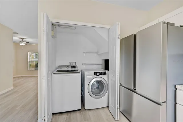 a utility room with dryer and washer