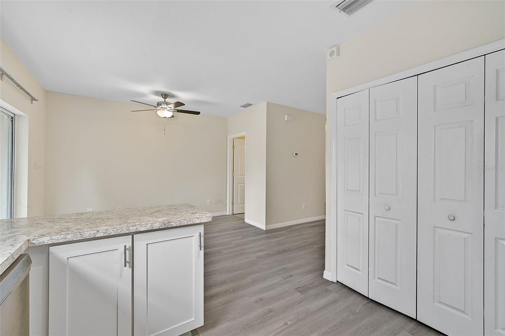 14939 Amberjack Terrace, Unit 102 Lakewood Ranch, FL 34202 - Photo 13 of 34 a view of an empty room with wooden floor