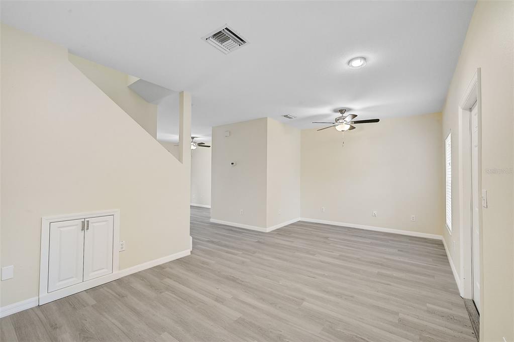 14939 Amberjack Terrace, Unit 102 Lakewood Ranch, FL 34202 - Photo 17 of 34 a view of an empty room with wooden floor