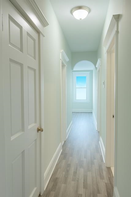 801 John F. Kennedy Boulevard, Unit 2 Bayonne, NJ 07002 - Photo 7 of 8 a view of a hallway with wooden floor
