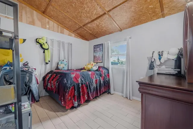 a bed room with a bed and a couch