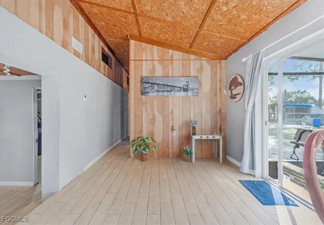 a view of entryway with wooden floor