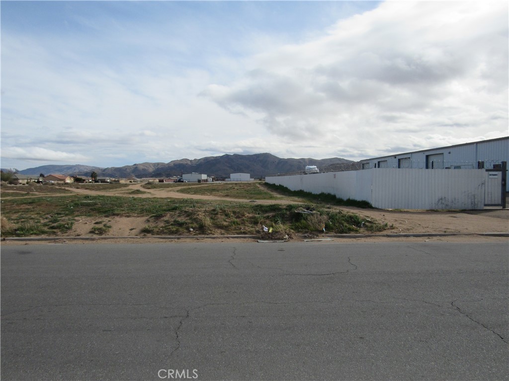 a view of a lake with a city in the background