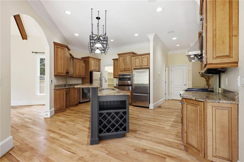 5 St Andrews Way Rome, GA 30165 - Photo 23 of 75 a kitchen with stainless steel appliances granite countertop a refrigerator a stove and a sink