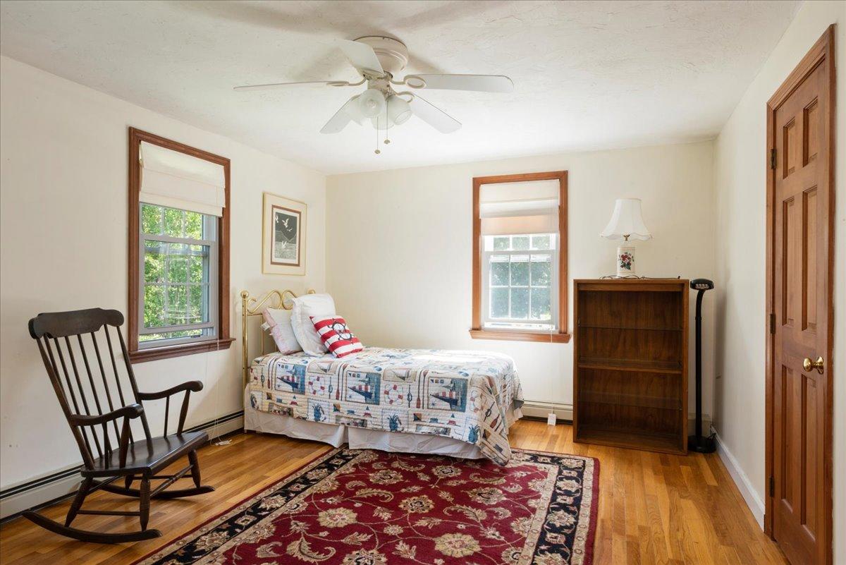2 Crowell Road Sandwich, MA 02563 - Photo 12 of 34 a bedroom with a bed and a window