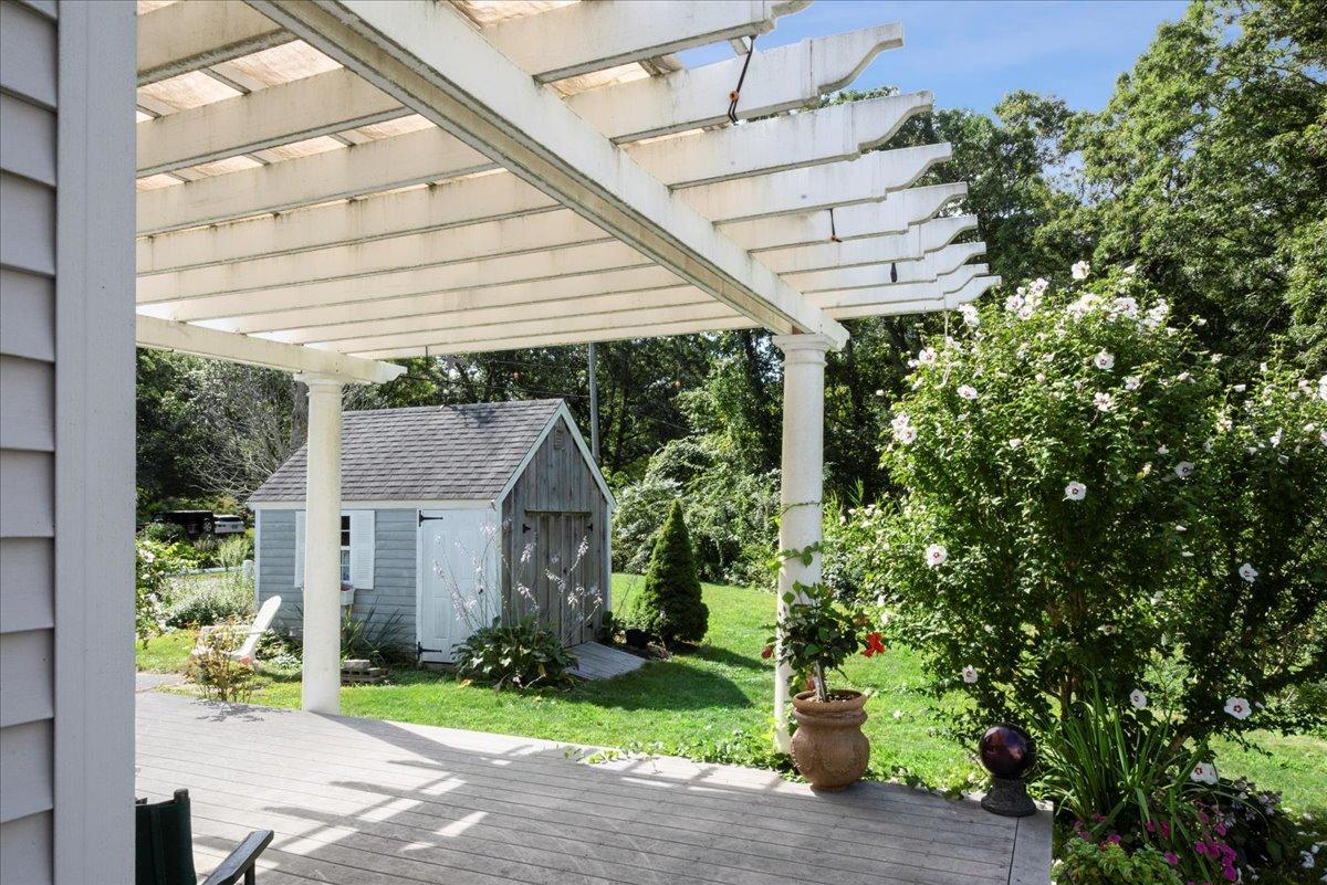 2 Crowell Road Sandwich, MA 02563 - Photo 19 of 34 a porch with seating space