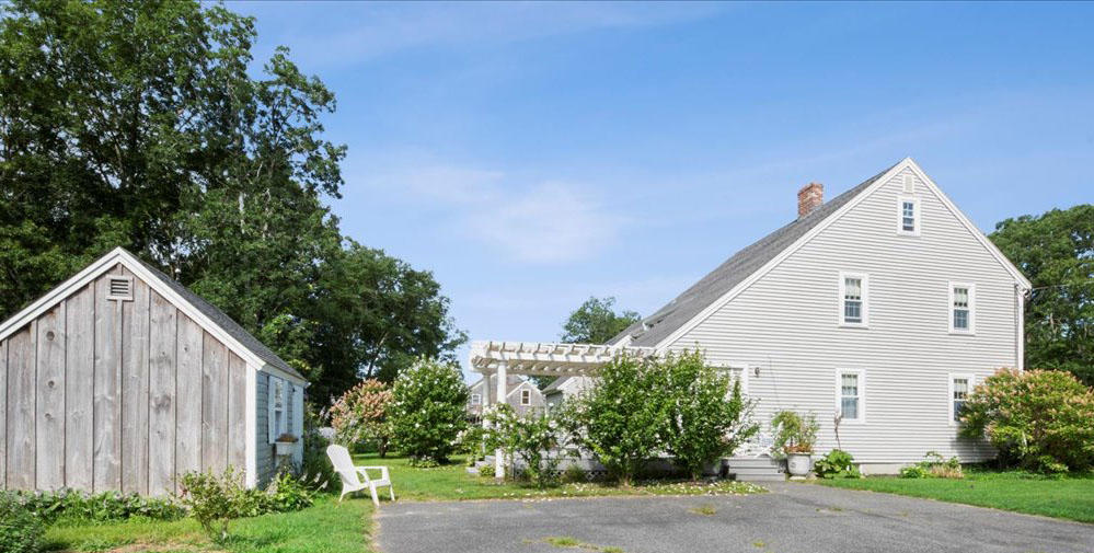 2 Crowell Road Sandwich, MA 02563 - Photo 22 of 34 a view of a house with a yard