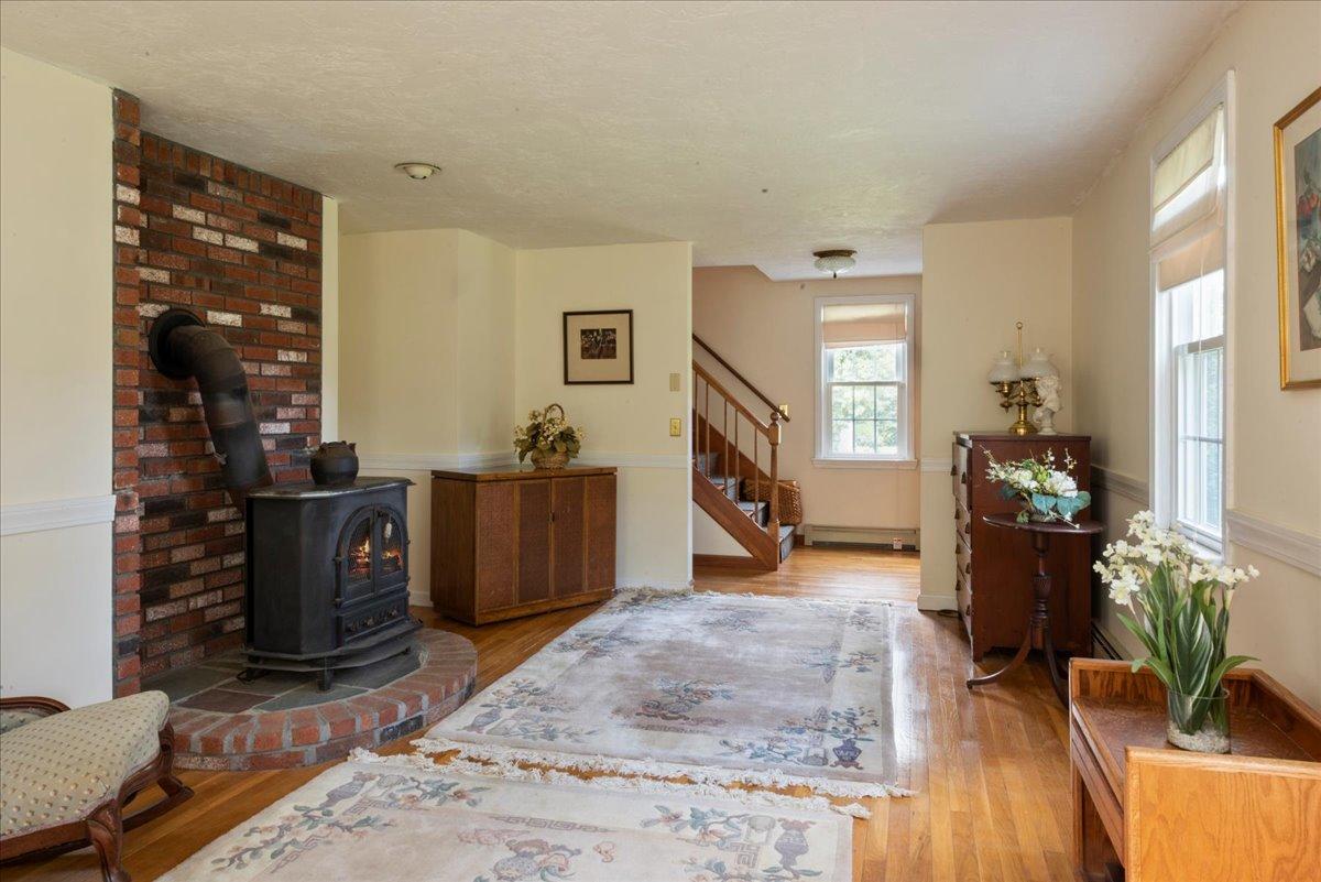 2 Crowell Road Sandwich, MA 02563 - Photo 5 of 34 a living room with furniture and a flat screen tv