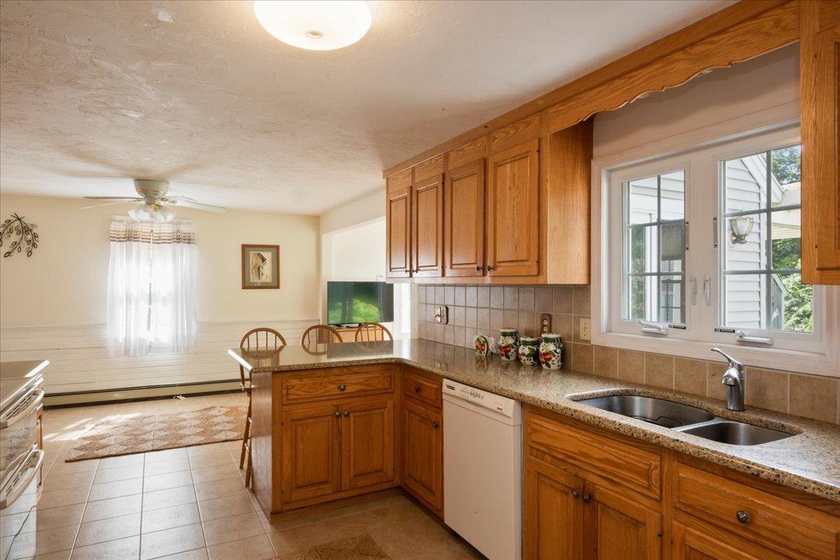 2 Crowell Road Sandwich, MA 02563 - Photo 7 of 34 a kitchen with a sink and cabinets