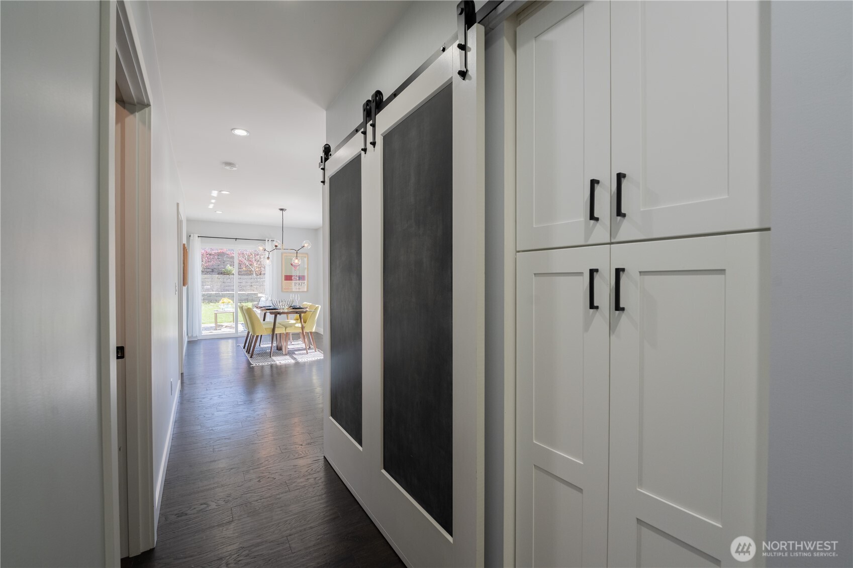 4418 40th Avenue Southwest Seattle, WA 98116 - Photo 12 of 40 a view of hallway with wooden floor