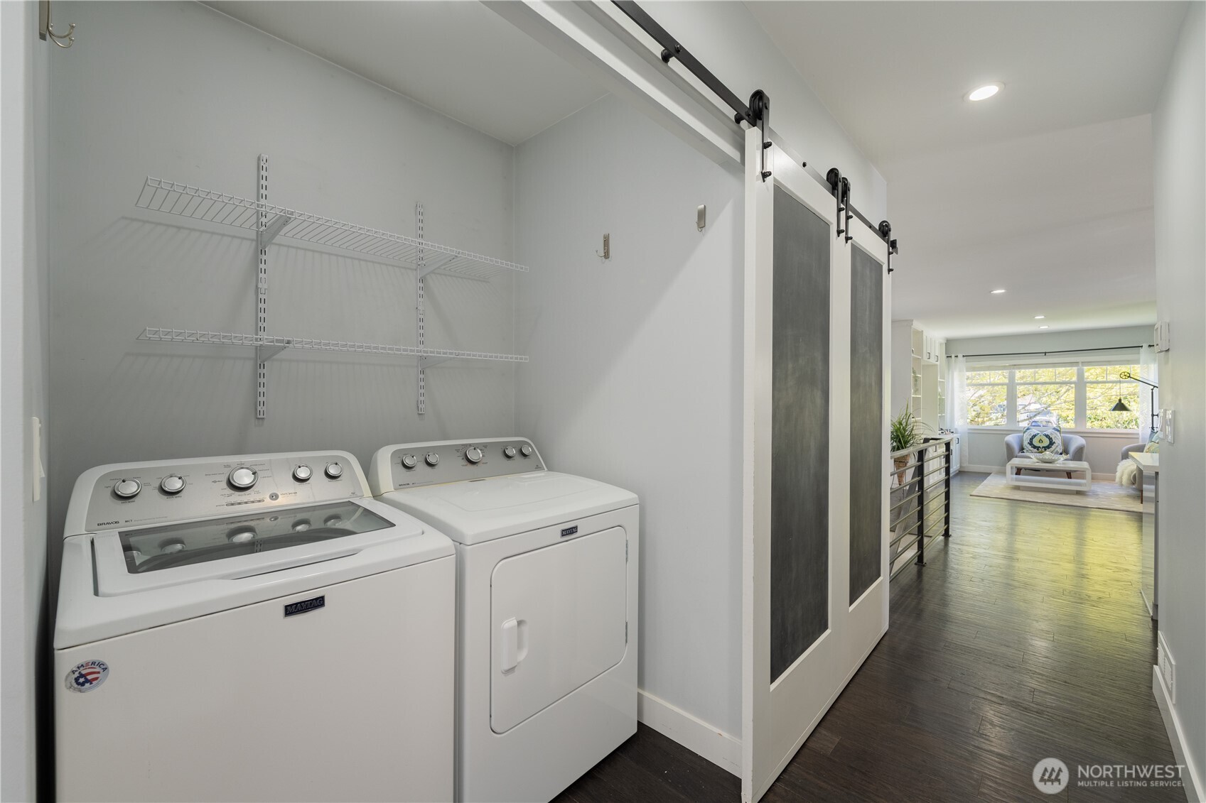 4418 40th Avenue Southwest Seattle, WA 98116 - Photo 13 of 40 a view of storage and utility room with washer and dryer