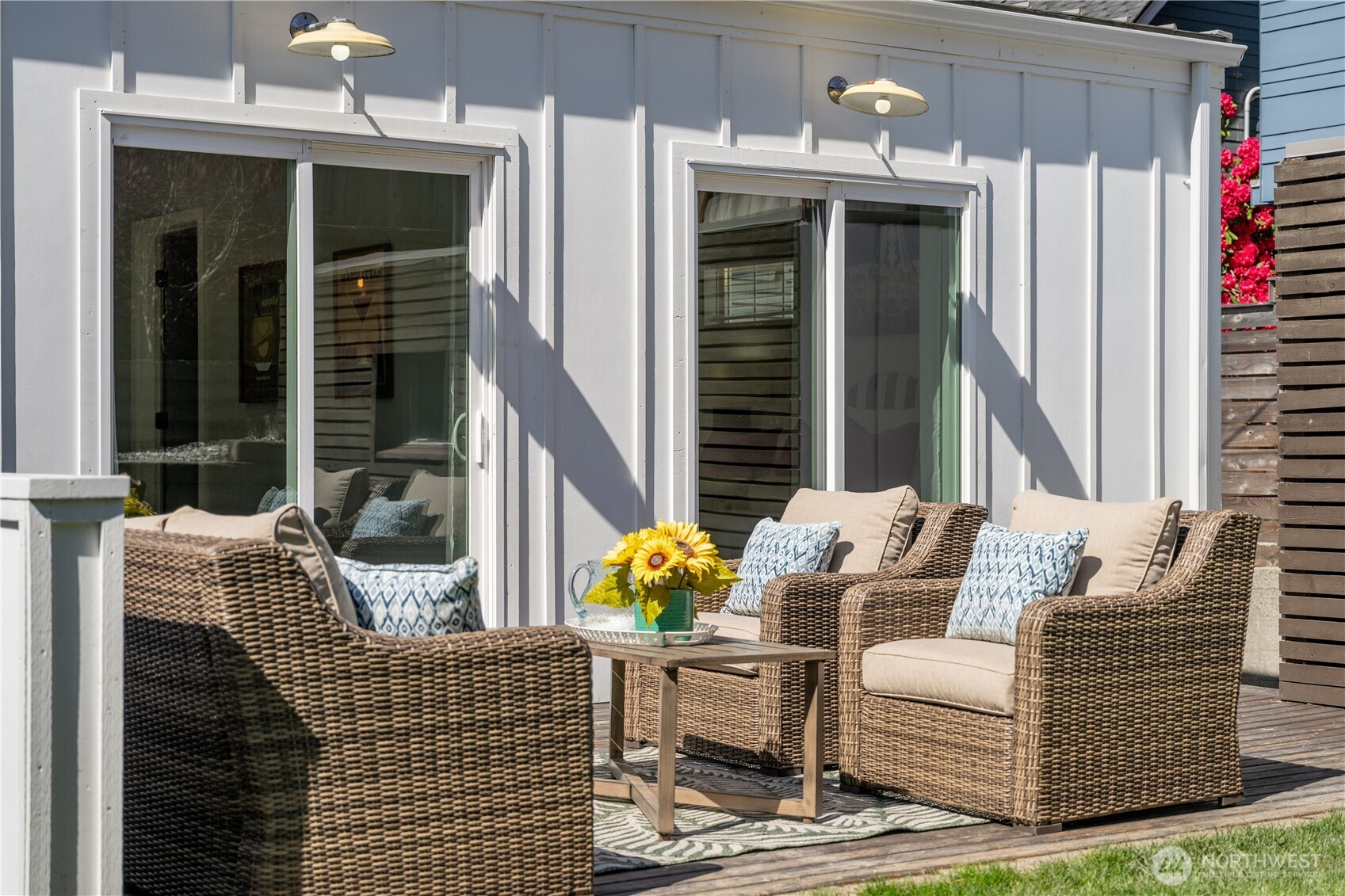 4418 40th Avenue Southwest Seattle, WA 98116 - Photo 20 of 40 a view of outdoor living space with patio furniture and potted plants
