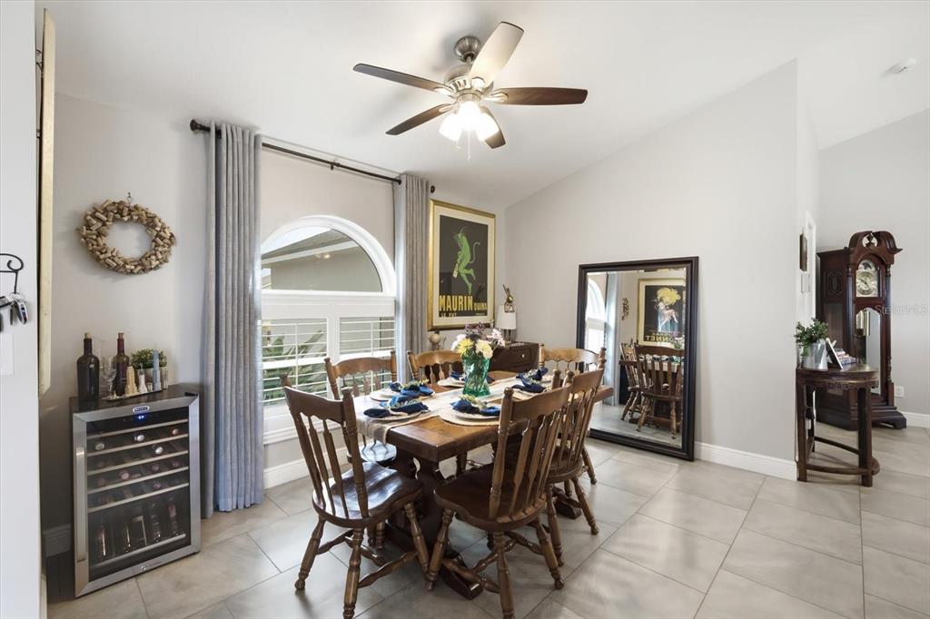 846 Birdie Way Apollo Beach, FL 33572 - Photo 20 of 31 a view of a dining room with furniture window and outside view