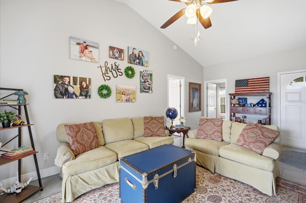 846 Birdie Way Apollo Beach, FL 33572 - Photo 23 of 31 a living room with furniture and a couch