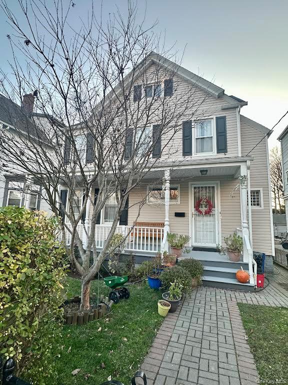 87 Franklin Avenue, Unit 1 New Rochelle, NY 10801 - Photo 2 of 11 Traditional-style home featuring covered porch