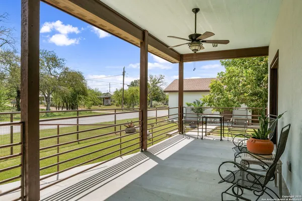 a view of a porch with seating area
