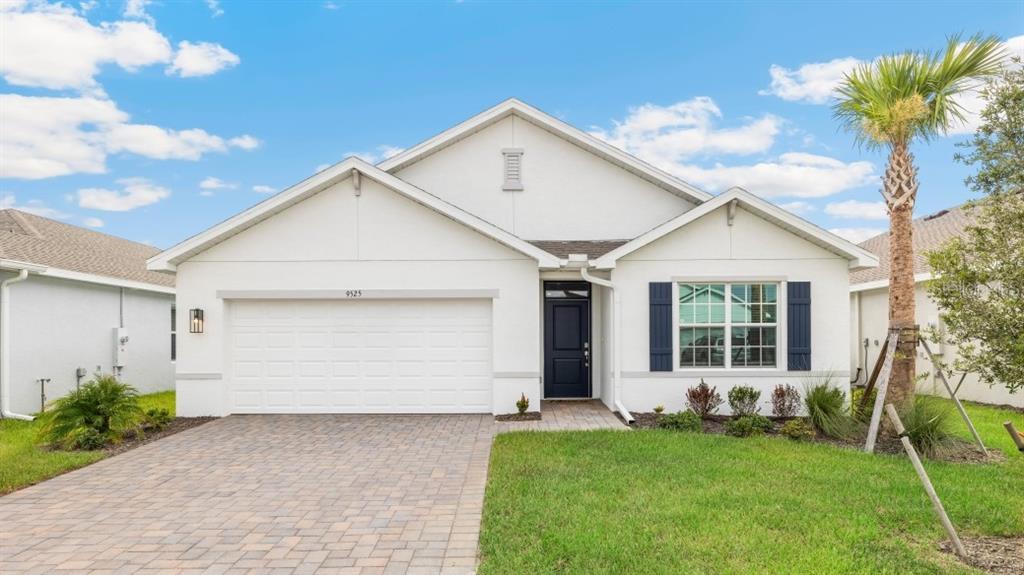 9489 Turtle Grass Circle Punta Gorda, FL 33950 - Photo 1 of 19 a view of a house with a yard