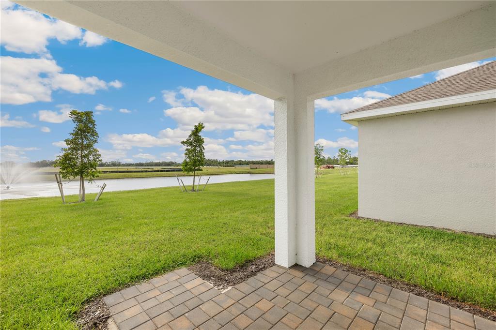 9489 Turtle Grass Circle Punta Gorda, FL 33950 - Photo 17 of 19 a front view of a house with a yard