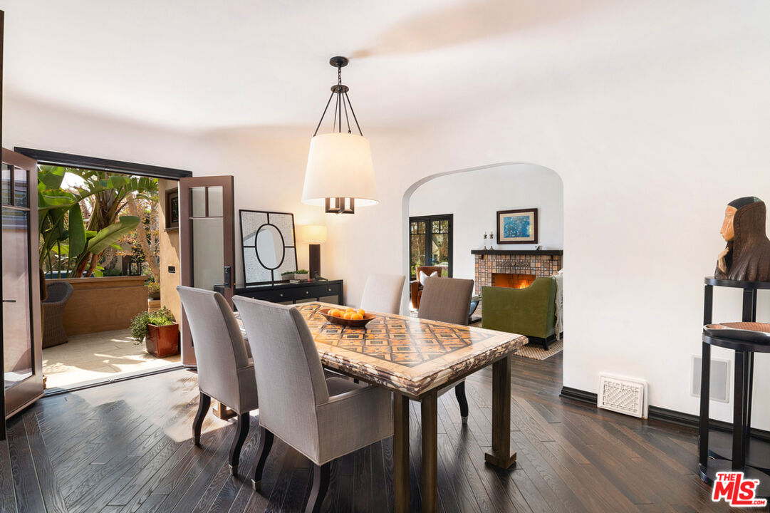 6331 Drexel Avenue Los Angeles, CA 90048 - Photo 12 of 37 a view of a dining room with furniture window and wooden floor