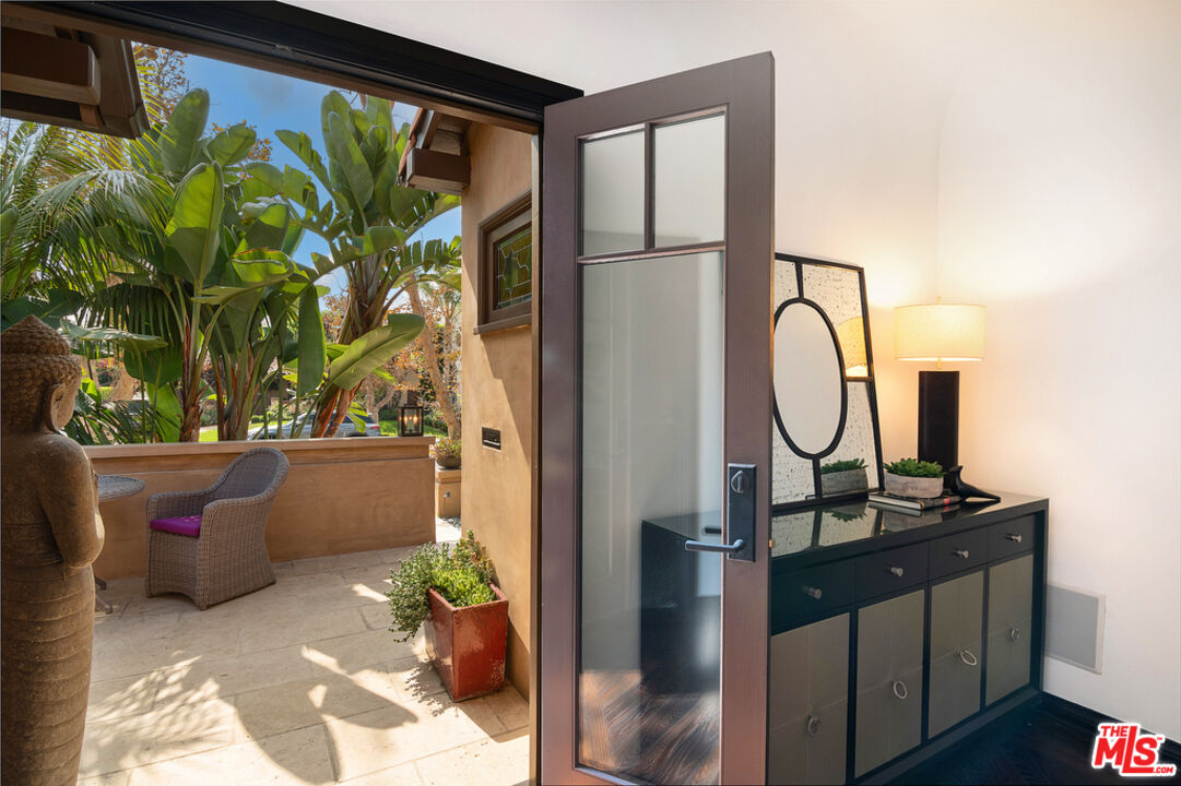 6331 Drexel Avenue Los Angeles, CA 90048 - Photo 13 of 37 a front view of a house with garden