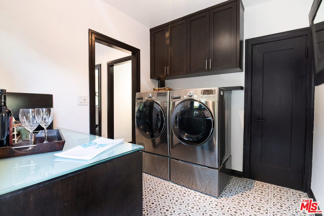 6331 Drexel Avenue Los Angeles, CA 90048 - Photo 21 of 37 a kitchen with a refrigerator and cabinets