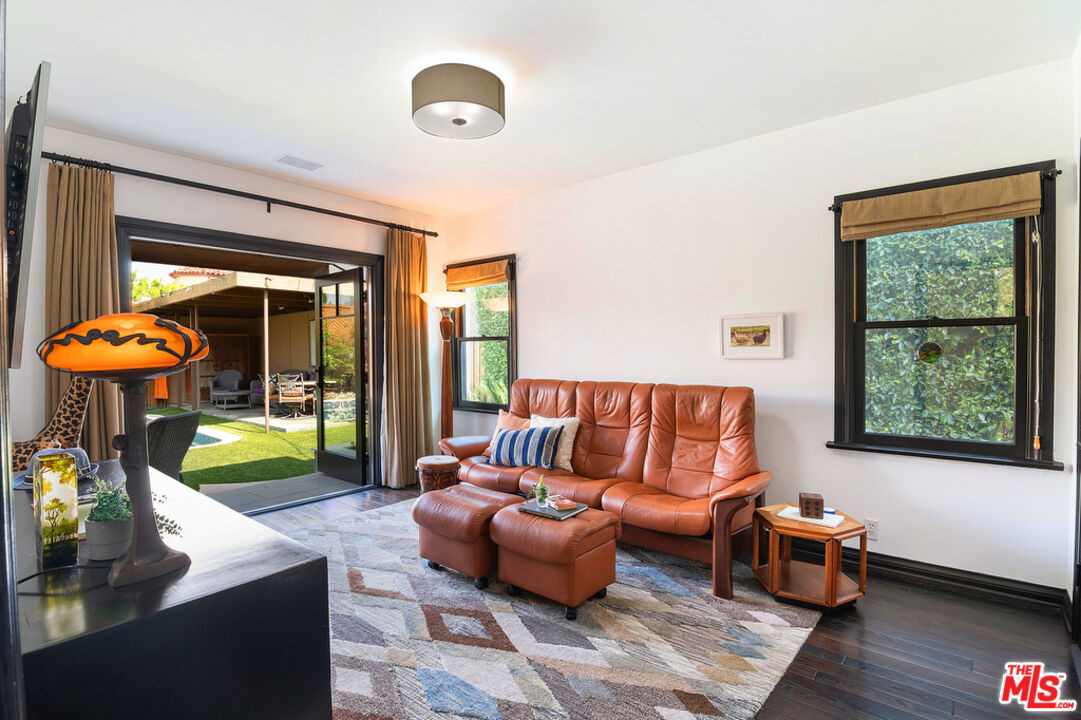 6331 Drexel Avenue Los Angeles, CA 90048 - Photo 23 of 37 a living room with furniture and a large window