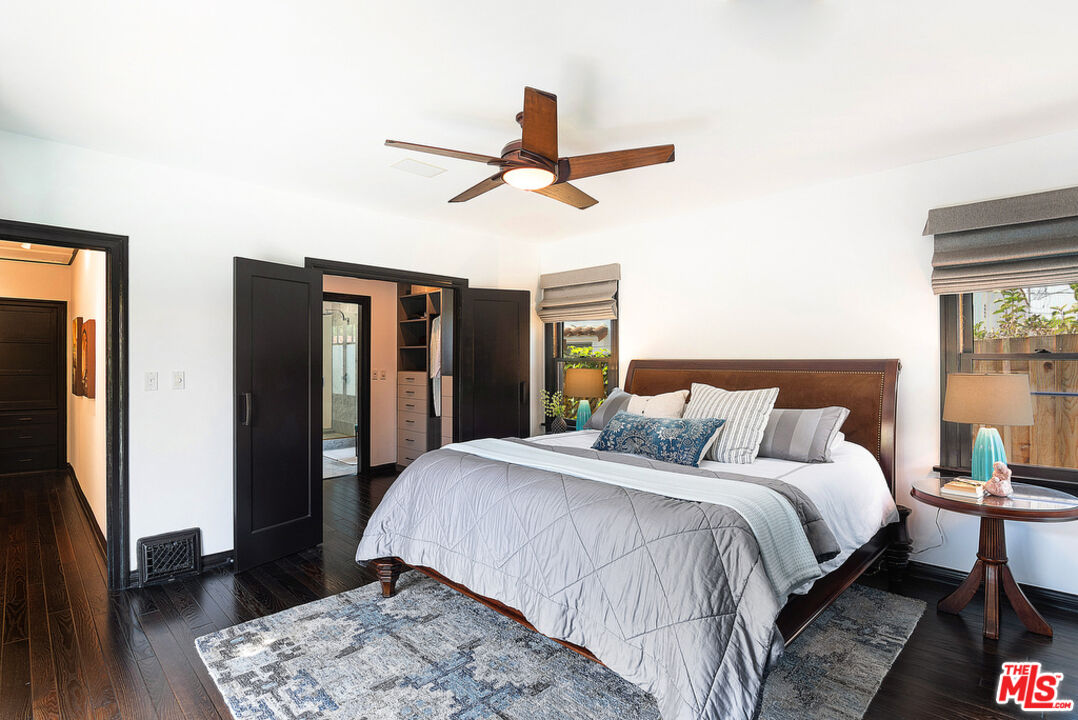 6331 Drexel Avenue Los Angeles, CA 90048 - Photo 26 of 37 a bedroom with a bed and wooden floor