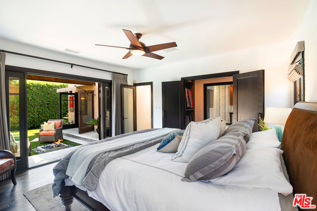 6331 Drexel Avenue Los Angeles, CA 90048 - Photo 28 of 37 a bedroom with a large bed and a large window