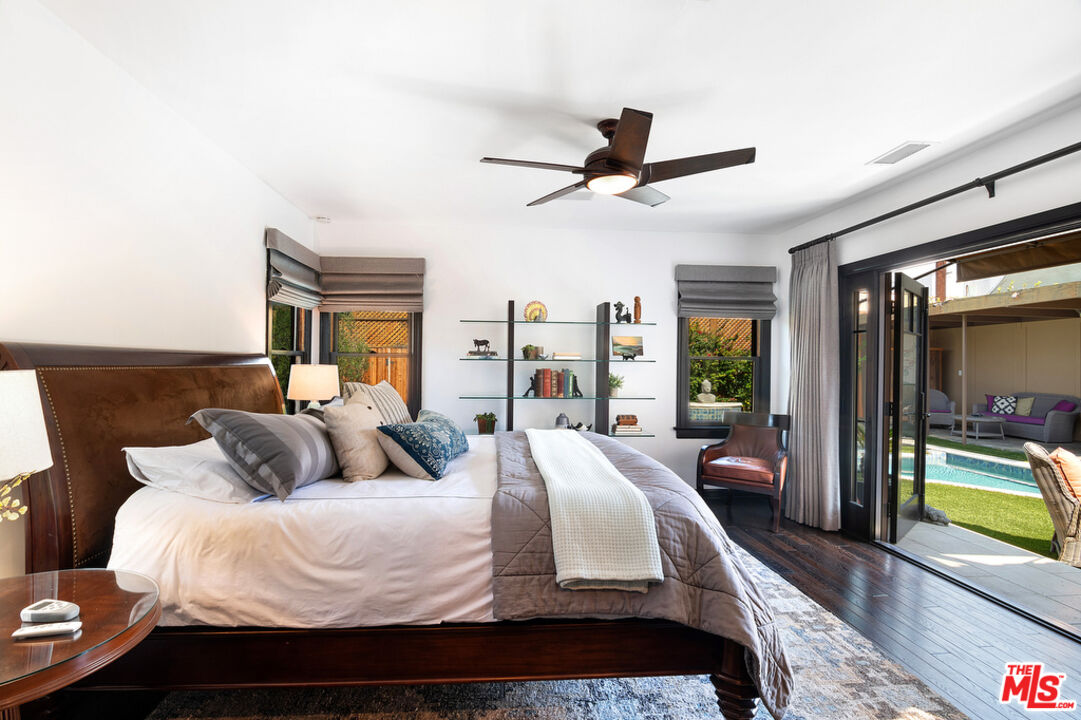 6331 Drexel Avenue Los Angeles, CA 90048 - Photo 29 of 37 a bedroom with a large bed and a large window