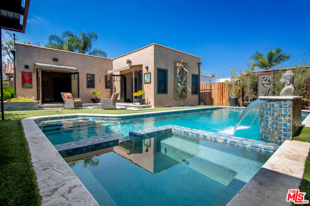 6331 Drexel Avenue Los Angeles, CA 90048 - Photo 36 of 37 a view of a house with swimming pool and sitting area