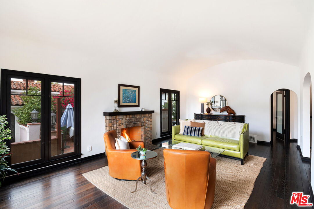 6331 Drexel Avenue Los Angeles, CA 90048 - Photo 6 of 37 a living room with furniture and a fireplace