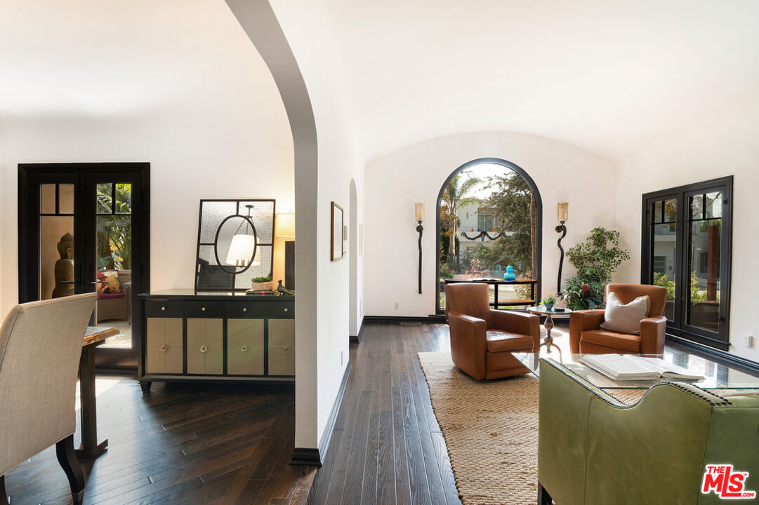 6331 Drexel Avenue Los Angeles, CA 90048 - Photo 8 of 37 a living room with furniture and a large window