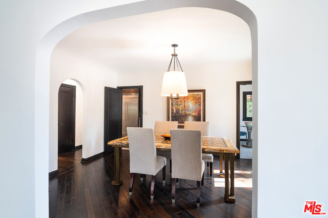6331 Drexel Avenue Los Angeles, CA 90048 - Photo 10 of 37 a view of a dining room with furniture and wooden floor