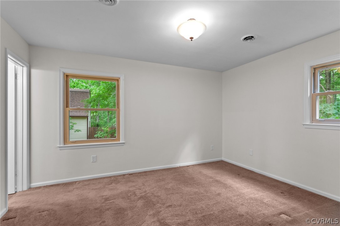 8601 Beaver Bridge Road Moseley, VA 23120 - Photo 19 of 42 an empty room with a window