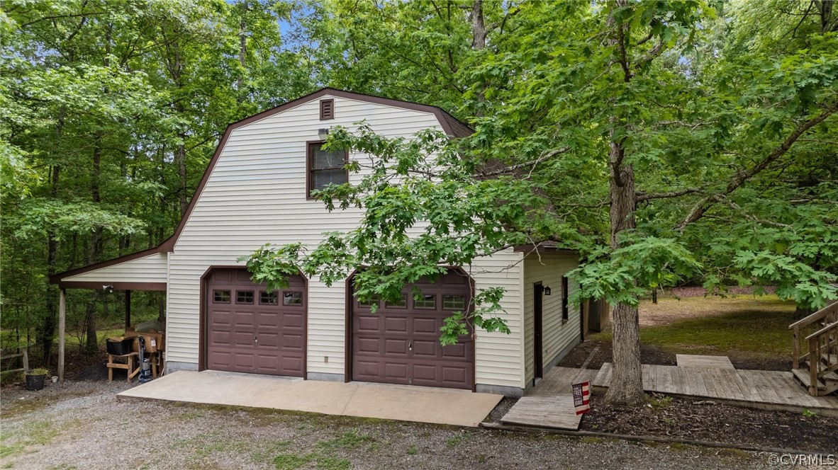8601 Beaver Bridge Road Moseley, VA 23120 - Photo 3 of 42 a front view of a house with a yard