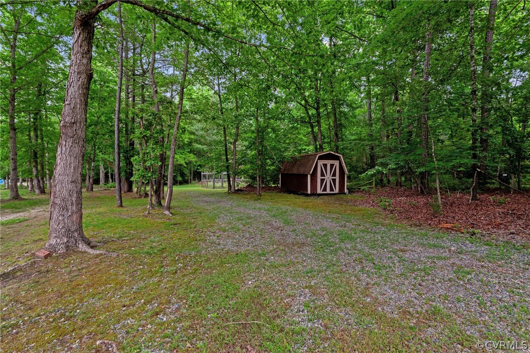 8601 Beaver Bridge Road Moseley, VA 23120 - Photo 32 of 42 a view of outdoor space with trees all around