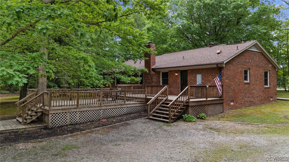 8601 Beaver Bridge Road Moseley, VA 23120 - Photo 39 of 42 a front view of a house with wooden fence