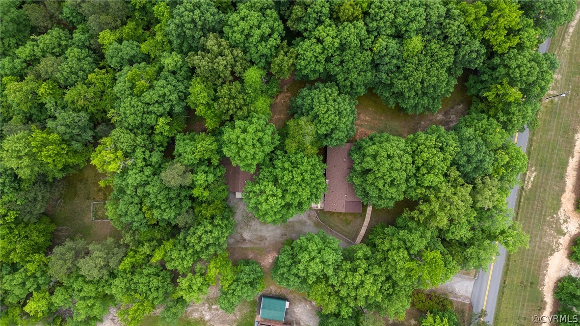 8601 Beaver Bridge Road Moseley, VA 23120 - Photo 41 of 42 an aerial view of a house with a yard
