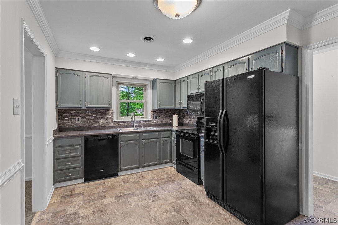 8601 Beaver Bridge Road Moseley, VA 23120 - Photo 6 of 42 a kitchen with granite countertop a refrigerator and stove